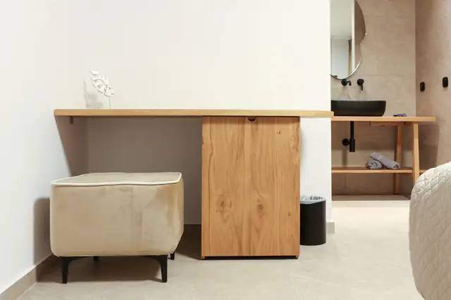 Dressing desk with an upholstered ottoman